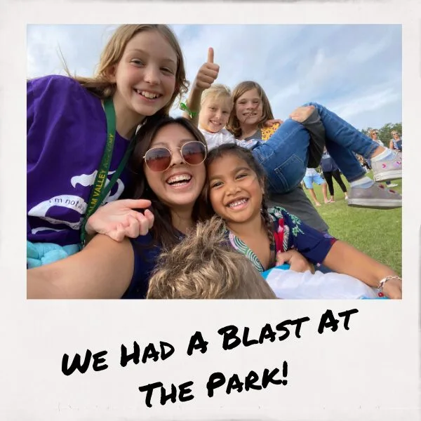 au pair at a cultural event with host kids and friends